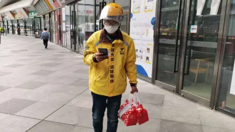 Li Yan Being a food delivery rider, Mr Li feels he can not only give back to the medical community but to the city's vulnerable too.