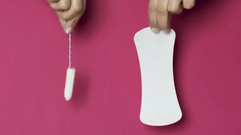 Getty Images A tampon and a sanitary pad