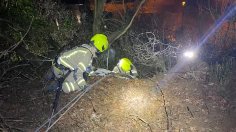 Gloucestershire Fire and Rescue Service  Rescue crews use their safe working at height equipment to carry out the rescue