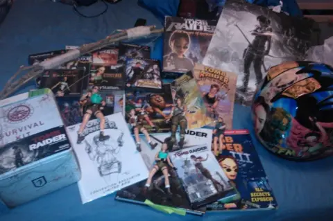 Amy Dyson A photo taken in 2014 of the collection's early days shows posters and games piled together on a bed.
