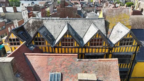 Ian Holl A more bird's eye view of the brightly restored building from a higher angle.
Just in front is another building with a red tiled roof.
