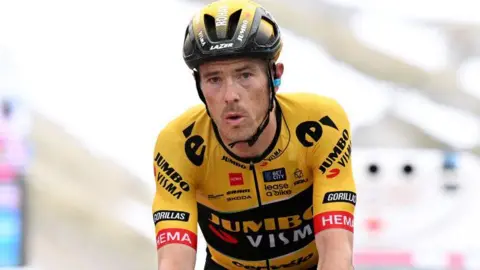 Getty Images Rohan Dennis in his cycling uniform