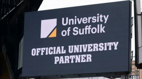 ITFC Sign showing the club's official university partner