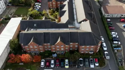 A large retirement complex pictured from a drone. 