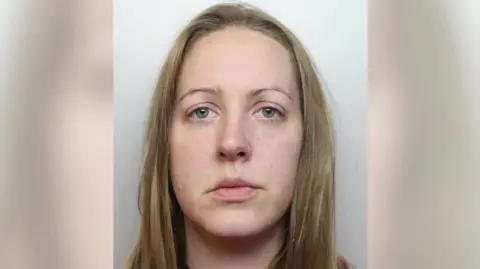 Cheshire Police A mugshot of Lucy Letby - a young blond woman with a serious expression 