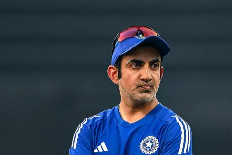 AFP via Getty Images India's head coach Gautam Gambhir is pictured before the start of the Asia Cup 2025 Twenty20 international cricket match between India and Oman at the Sheikh Zayed Cricket Stadium in Abu Dhabi on September 19, 2025. (Photo by SAJJAD HUSSAIN/AFP via Getty Images)
