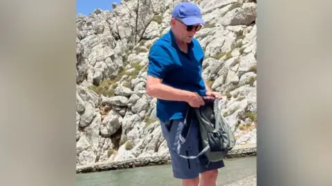 Facebook A photo of Dr Mosley on holiday in Symi was shared on a local Facebook group on Wednesday