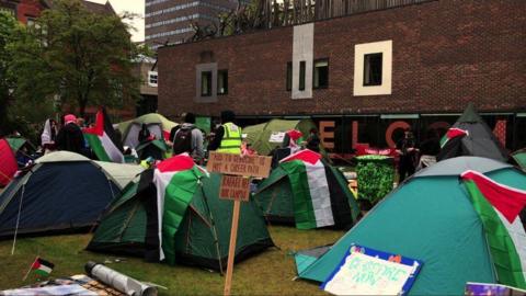 Tents and placards outside the Northern Stage building