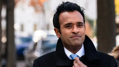 Getty Images Close up of Vivek Ramaswamy outside wearing a suit and tie