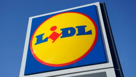 PA Media A generic picture of a Lidl supermarket sign