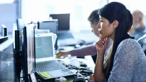 Getty Images Working in an office