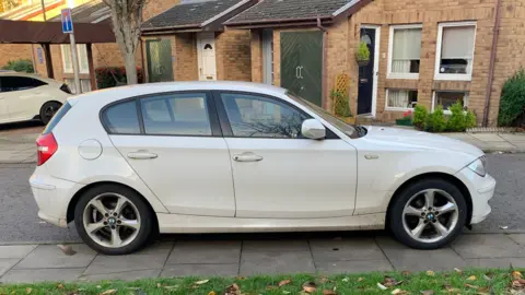 BBC car parked on pavement