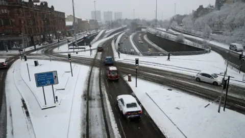 PA Snow covered cars in Charing Cross, Glasgow,