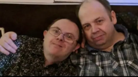 Family photo Darren and Dean Lewis