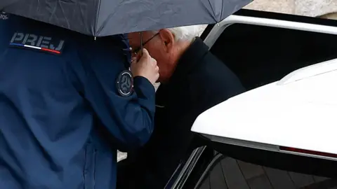 Reuters Le Scouarnec leaving a car