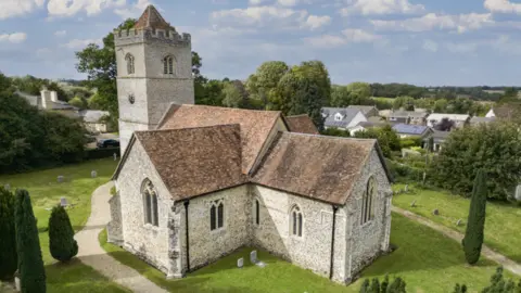 National Churches Trust A white church with a red roof.