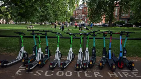 Reuters Row of e-scooters