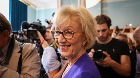Dame Andrea Leadsom smiling at the camera