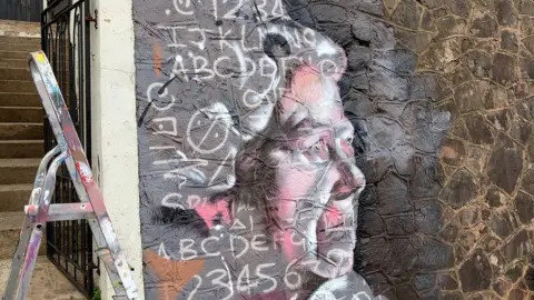 BBC The finished mural of the Queen