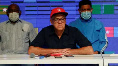 Reuters Parliamentary candidate Jorge Rodriguez looks on after the announcement of the results of the parliamentary election at the Bolivar Theater in Caracas, Venezuela, December 6, 2020