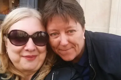 Family handout Michele Chilvers (left) and wife Terri