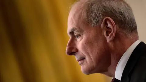 BRENDAN SMIALOWSKI John Kelly, looking into the distance