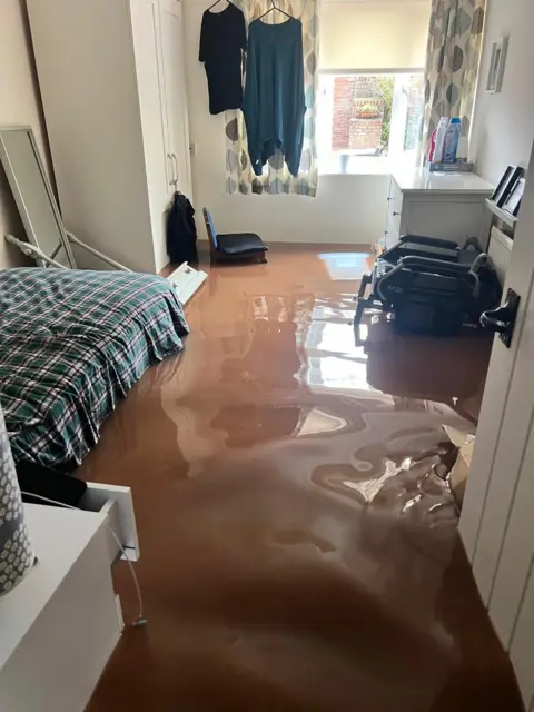 Gillian Haycock A bedroom at Chippenham Court under water.