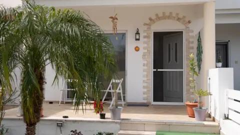PA Media The couple's home in Tremithousa, Cyprus, where Janice died