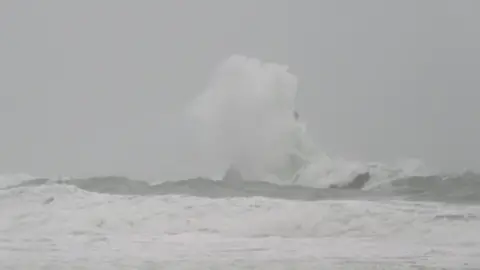 Duncan Bruce High waves pounded Church Rock, at Broad Haven South Beach, in Pembrokeshire