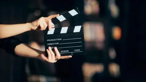 A clapperboard seen on a film set