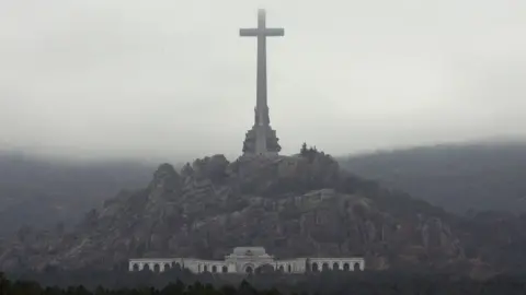 Getty Images A heavy fog lies over the Valle de los Caidos (Valley of the Fallen) monument on November 20, 2005 in El Escorial, Spain