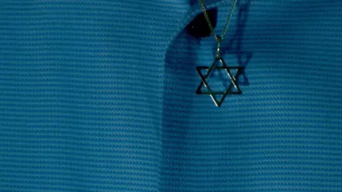 BBC Star of David on a doctor's shirt