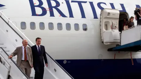 Getty Images Vince Cable and David Cameron