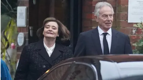 Stefan Rousseau/PA Sir Tony and Cherie Blair