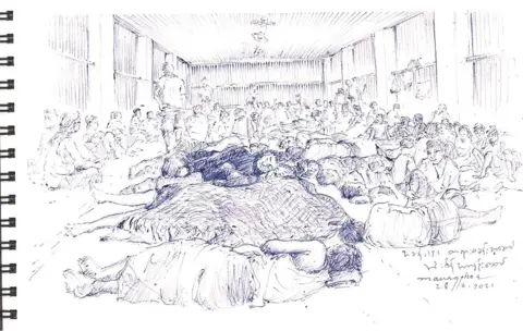 Prisoners sleeping together in crowded room