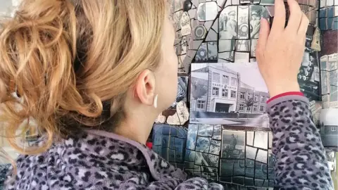 Anne-Schwegmann-Fielding Positioning tiles to make up the sculpture