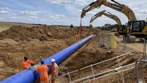 Ben Schofield/BBC Anglian Water's strategic pipe being laid