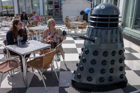 Ian Forsyth/Getty Images A Dalek interacts with visitors on day one of the Scarborough Sci Fi weekend on April 20, 2024 in Scarborough, England.