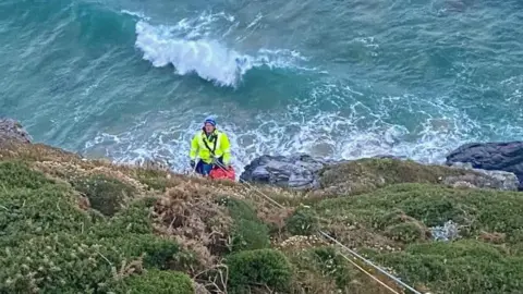 Padstow Coastguard Cliff technician on cliff face