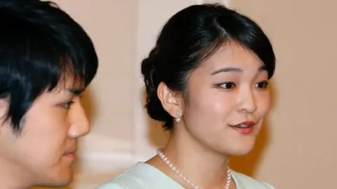 AFP Princess Mako and Kei Komuro at a press conference to announce their engagement in September 2017.