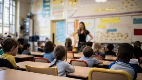 Getty Images Teacher in class