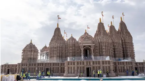 Construction workers at the site of the BAPS Hindu Mandir temple in Abu Dhabi, United Arab Emirates, on Wednesday, Jan. 31, 2024