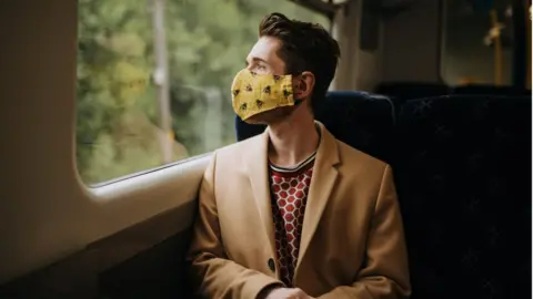 Getty Images man wearing face mask