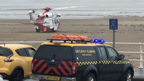 @Beachdog_Wales The coastguard helicopter on the beach at Neath Port Talbot