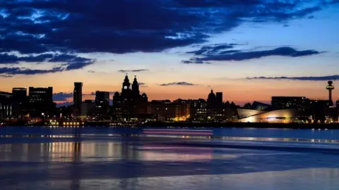 PA Media Liverpool skyline at sunset