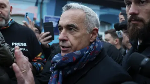 Getty Images A headshot of Calin Georgescu in the crowd