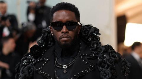 Sean Diddy Combs appears in an all-black outfit at the Met Gala in 2023
