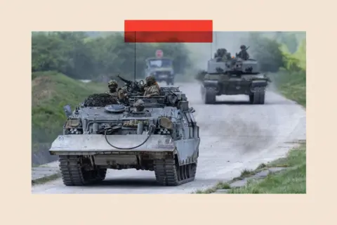 AFP via Getty Images British soldiers drive a Challenger Armour and Repair Recovery Vehicle as they take part in urban combat exercise