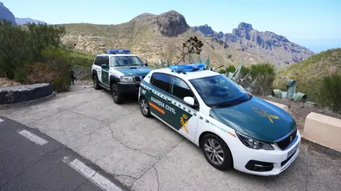 PA Media Two Guardia Civil police cars in Tenerife's national park