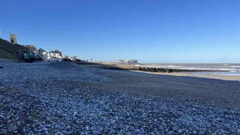Martin Barber/BBC A view of Cromer beach on a sunny and cloudless day.